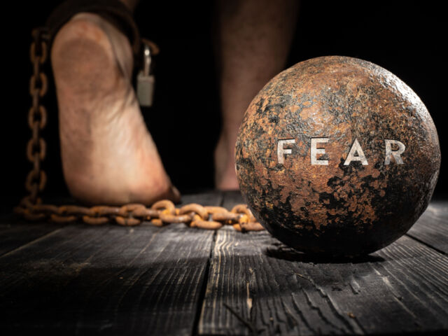 Fear,Is,Ball,On,The,Leg.,Concept,Of,Fear.